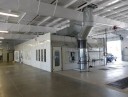 A neat and clean and professional refinishing department is located at Baker Nissan North, Houston, TX, 77065