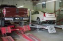 Professional vehicle lifting equipment at Custom Greg's, Inc., located at Oneida, TN, 37841, allows our damage estimators a clear view of all collision related damages.
