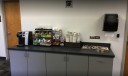 We have coffee in our waiting area at our body shop, located at Rock Hill, SC, 29732  while you wait.